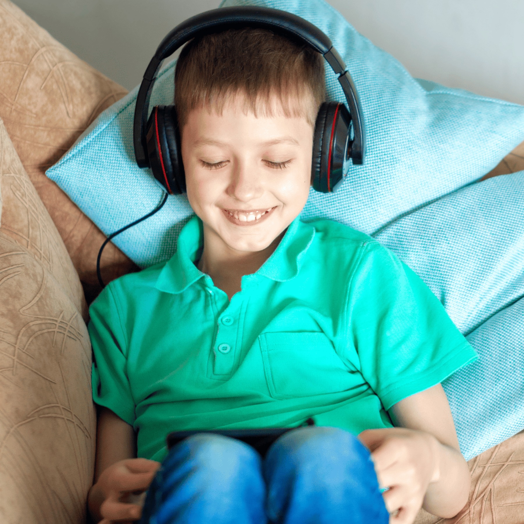 boy listening to audio book 